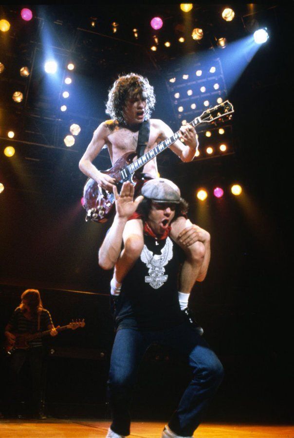 Angus Young and Brian Johnson live at the Met Center in Bloomington, Minnesota, November 22, 1981. Photo by Ebet Roberts.