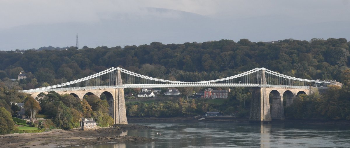 angleseycouncil's tweet photo. Happy Birthday to the Menai Suspension Bridge

Today marks 200 years since this iconic landmark was officially opened on 30/01/1826.

Designed by engineer Thomas Telford, it was among the earliest suspension bridges built to carry road traffic—revolutionising travel. https://t.co/28TxjRYBO3