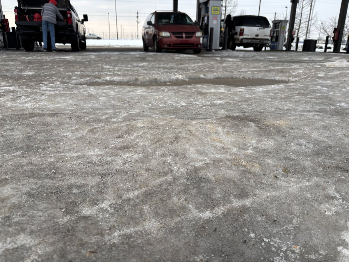 Gas station parking lot in Batesville. Still a thick layer of ice despite a couple of days of sun and above freezing temps this week. Car is showing 32 degrees here currently.