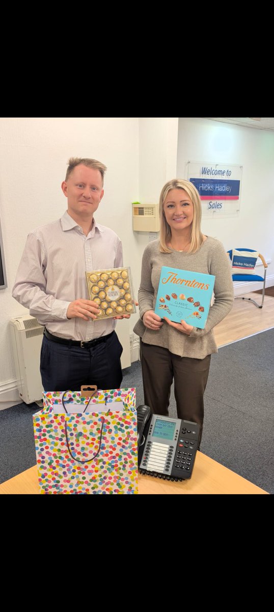 HicksHadley's tweet photo. New year's resolutions are in danger! 
A very grateful first time buyer generously brought chocolates in for Jon and Charlotte this week 🤤 https://t.co/tOEjU2oWZD