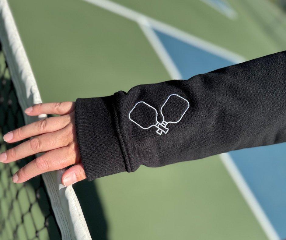 At Dink and Volley, every piece of apparel is designed with intention, passion, and pickleball spirit in mind. Our original designs are thoughtfully hand‑drawn by co-founder Megan in Orange County, California, bringing unique details and quality craftsmanship to every tee, tank,