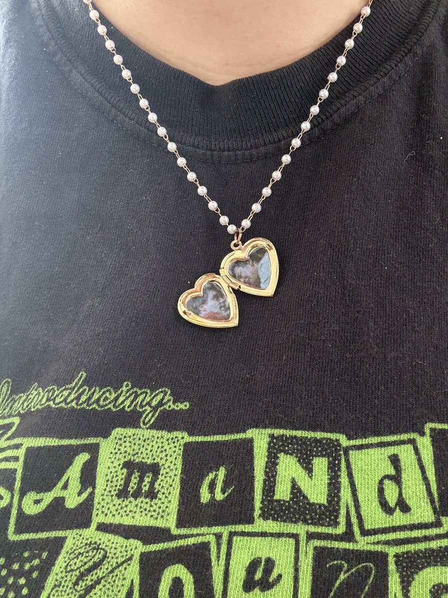 amandasfemme's tweet photo. wearing the sawket (saw locket) and my superyaki x @misnamedplants mandy shirt to the doctors office to give me strength https://t.co/Xet219byEc