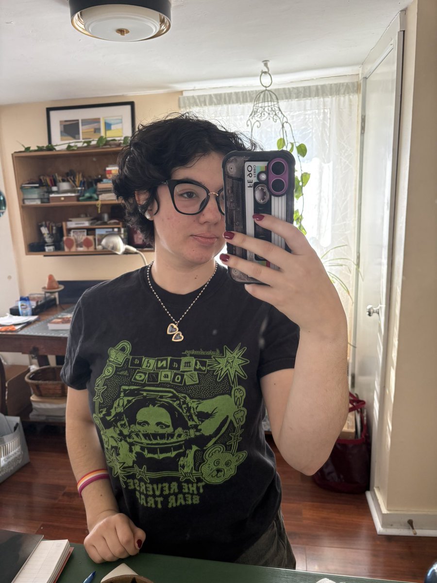 amandasfemme's tweet photo. wearing the sawket (saw locket) and my superyaki x @misnamedplants mandy shirt to the doctors office to give me strength https://t.co/Xet219byEc
