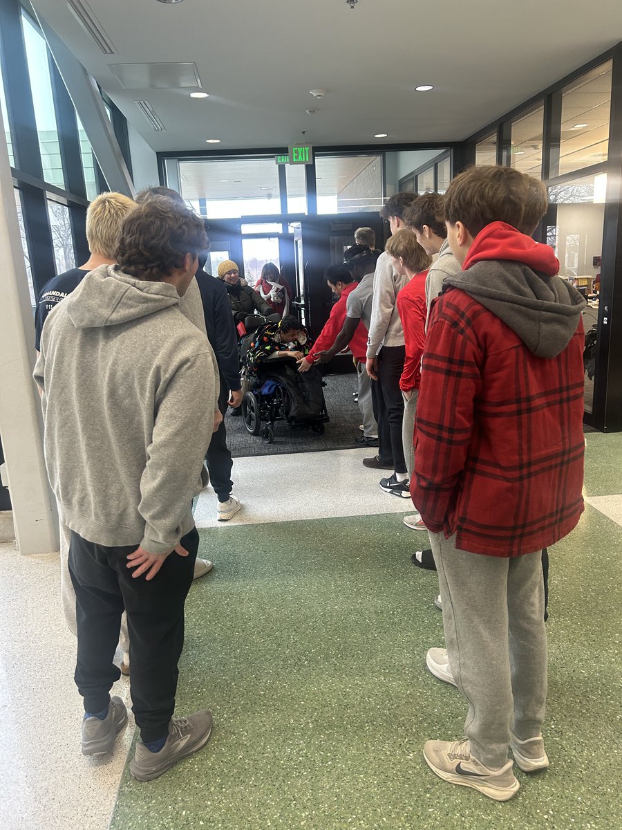 UrbandaleCSD's tweet photo. This morning the UHS J-Hawk Wrestling team showed up ready to greet Valerius students. They jumped right in with high fives, smiles, & dance moves. The atmosphere was electric for both the students and the players! Way to show the J-Hawk Way! #UHSPride #VALPride #AllABoutU https://t.co/N6gYtEzlcu