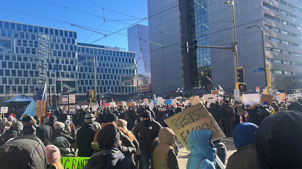 jessemckinley's tweet photo. In #Minneapolis, substantial crowd downtown as general strike demonstration begins…drones and copters overhead. Peaceful and sign-heavy: https://t.co/Zr98IcTbIq