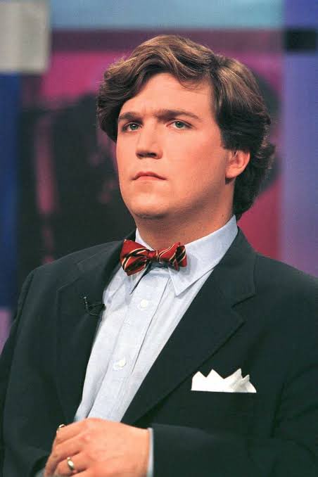 CBHeresy's tweet image. How did Tucker Carlson rebrand from the country-club legacy grandchild who scoffs when the golf-course sprinkler repairman uses the main entrance to the bitter son of the sprinkler repairman who watched his father die due to lack of health insurance?