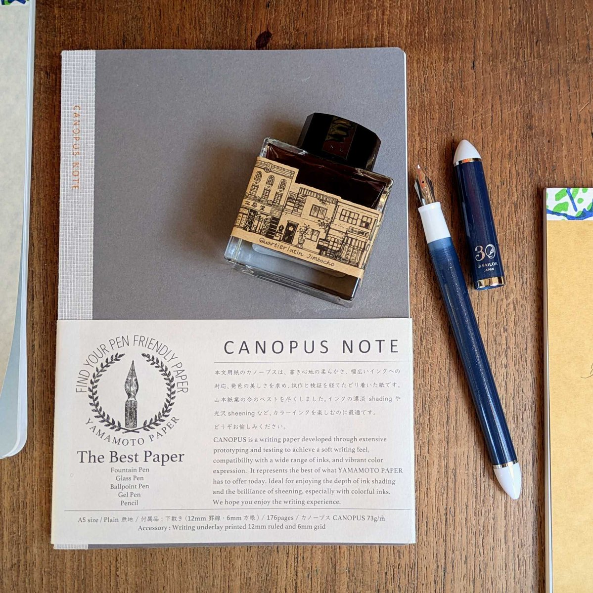 bungbox's tweet image. BUNGUBOX神保町のお店は本日11時から18時まで営業いたします！

軽やかで滑らかな書き心地で、発色も抜群の山本紙業のCANOPUS NOTEが再入荷しました。

SAILORふでDEまんねんの30周年記念限定カラーも「黎明ブルー」が僅少ございます！…