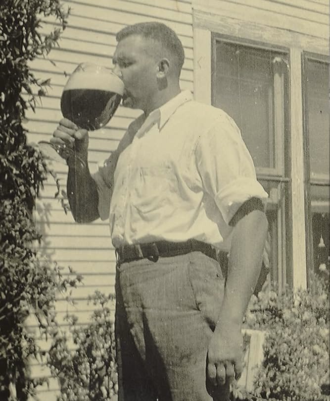 Robert E Howard, creator of Conan the Barbarian, with goblet of ale.

Cross Plains - Texas, c.1930
