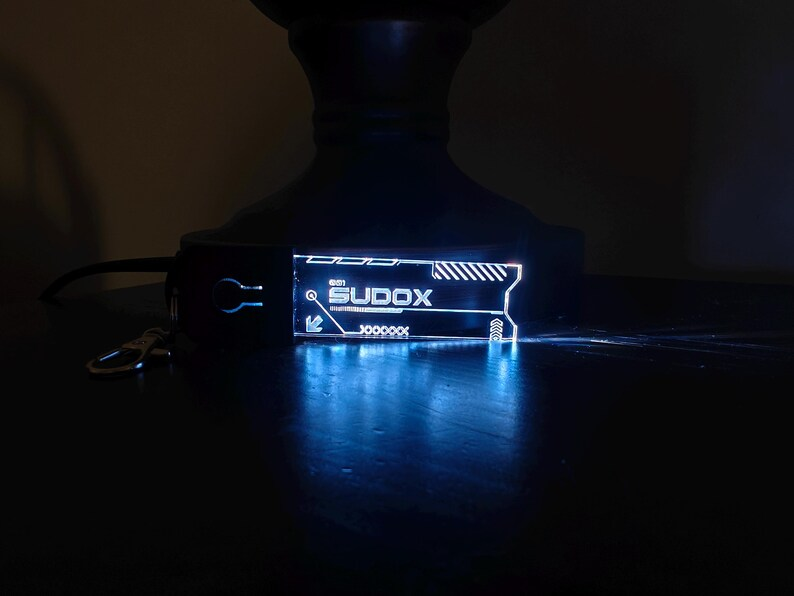 As promised, here are the links for the custom cyberpunk tags.

NOTE: You are not forced to pick a color. The RGB base lets you pick 7 colors at your leisure or have it auto-cycle. You're just picking the design + the name you want on the tag. 

#1 - etsy.com/listing/444352…

#2 -