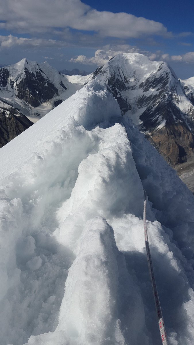 j_muhia's tweet photo. There are moments, brief seconds, that are impossible to forget. Split seconds that define lifetimes. 
Every now and then, I relive a few seconds of the afternoon of 8th August 2019.

Alex (my guide) and I were descending Khan Tengri, after 'touching' 6,100m during our acclimitization climb. The aim was to descend down to basecamp for a few days of rest before summit push. Khan Tengri is a near perfect pyramid, with very steep faces. Most of the route is on 'knife edges'. Steep drops either side of the route. With fixed ropes almost throughout the route, securing myself on the ropes had become routine. 

Somewhere between Camp 2 and 1, I became a bit complacent. I made a near fatal mistake. 
I downplayed the need to clip on the fixed rope through one of the sections, thinking it was just a few steps to get to a more stable anchor point. After a few steps, I slipped, fell and started sliding down the mountain face. After what seemed like eternity, my fall to the abyss was suddenly and violently arrested. Luckily (and I was extremely lucky), the ice axe I was holding and desperately trying to dig into the ice with as I slid caught onto an old rope that had been left from previous expeditions. That slowed down the slide and I was was able to finally stop. All this while, Alex was shouting and screaming. I had slid for about 10 feet, but it felt like eternity; because that moment could have defined my eternity. 

Alex managed to get me back up the route after a lot of effort. We took sometime to regulate our breathing and acknowledge THAT moment. We then proceed to descend down to basecamp safely without much conversation. 

When we got to basecamp, and as if on cue, we just hugged and silently acknowledged that I was reckless for a moment. A moment that would have turned into eternity. #lessonslearned #lifelessons #mountainstories #mountainadventures