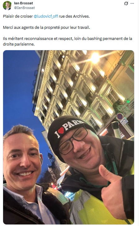 mtwit75's tweet image. De mieux en mieux. En pleine période de réserve, un agent municipal parisien en tenue de travail pose avec un candidat en campagne.