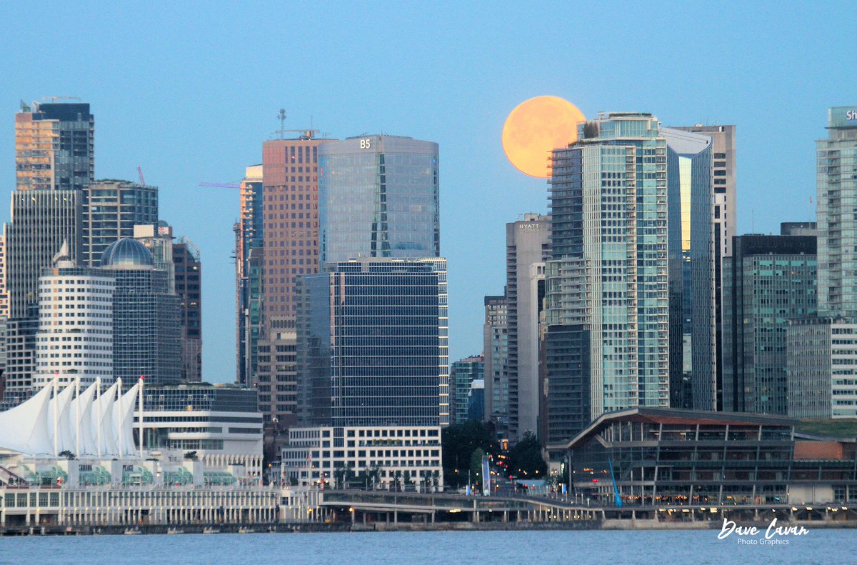 From an ongoing Vancouver series - The moon slipping behind the downtown towers of Vancouver on an early July morning in 2020. I saw this opportunity for a shot from the shipyards pier in North Vancouver, and just made it there in time! Sunrise is 6 minutes away.