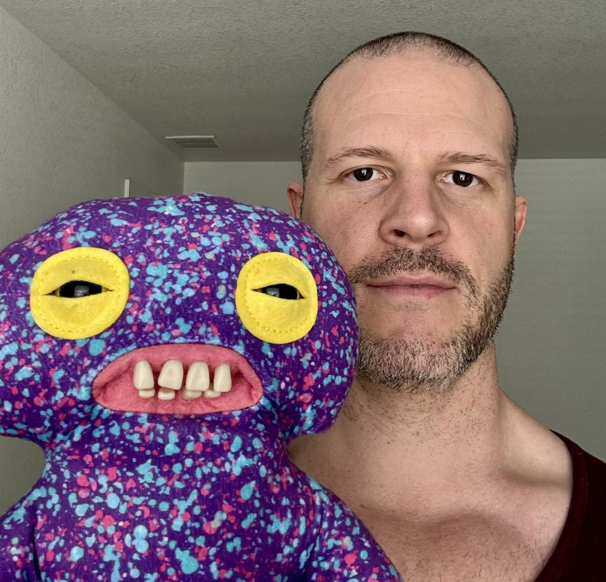embernst3633's tweet photo. @krakenfx When your own kids gift you a Fuggler with human teeth, that’s not a present, that’s a performance review.  
Dear @krakenfx, can we flip this mid‑life crisis into 1 BTC instead? #GiftFlip https://t.co/njm30E44CL