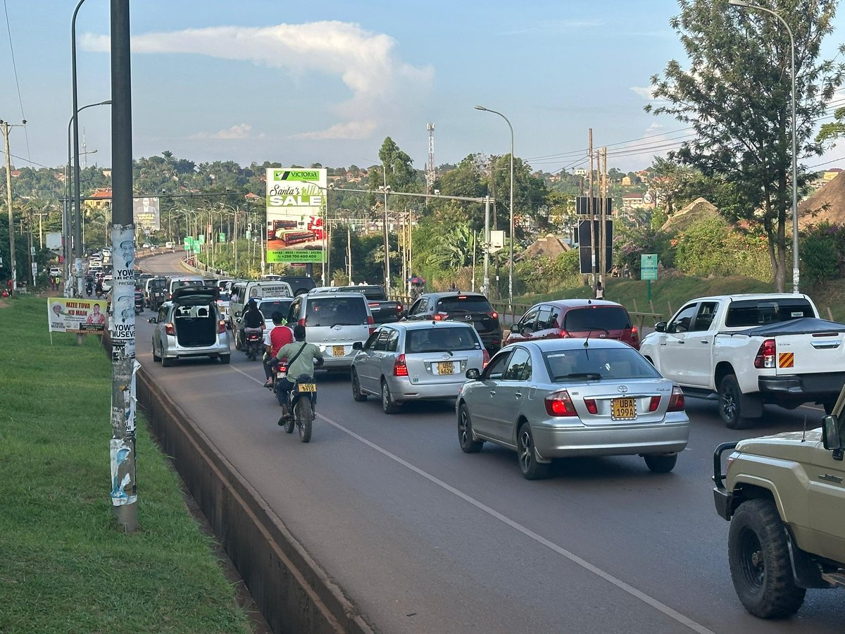Motorists gridlocked along Kampala-Entebbe Road as security operatives set up a checkpoint at Kitubulu Katabi in Wakiso District for unknown reasons. 
Motorists are being asked to share their particulars before being allowed to proceed.
It has now been days since this started