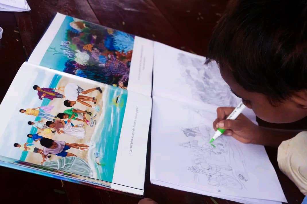TimorMBO's tweet photo. The Movimentu Leitura ba Transformasaun Sosiál, engaged children (12/01) on the importance of the ocean and all its creatures. The children read and coloured the 'My Sea, My Timor' book to learn about the vital role of the ocean in Timor-Leste’s sustainable development 🇹🇱🌊🪸🐳 https://t.co/E80D1TqBnC