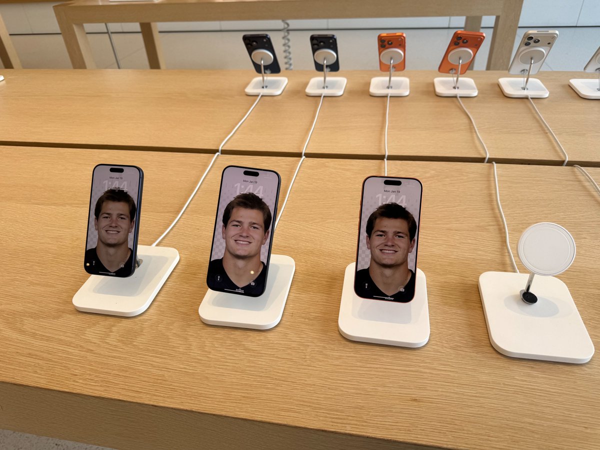 OnlyInBOS's tweet image. Someone has updated every iPhone inside the Apple Store in Dedham with a picture of Drake Maye.