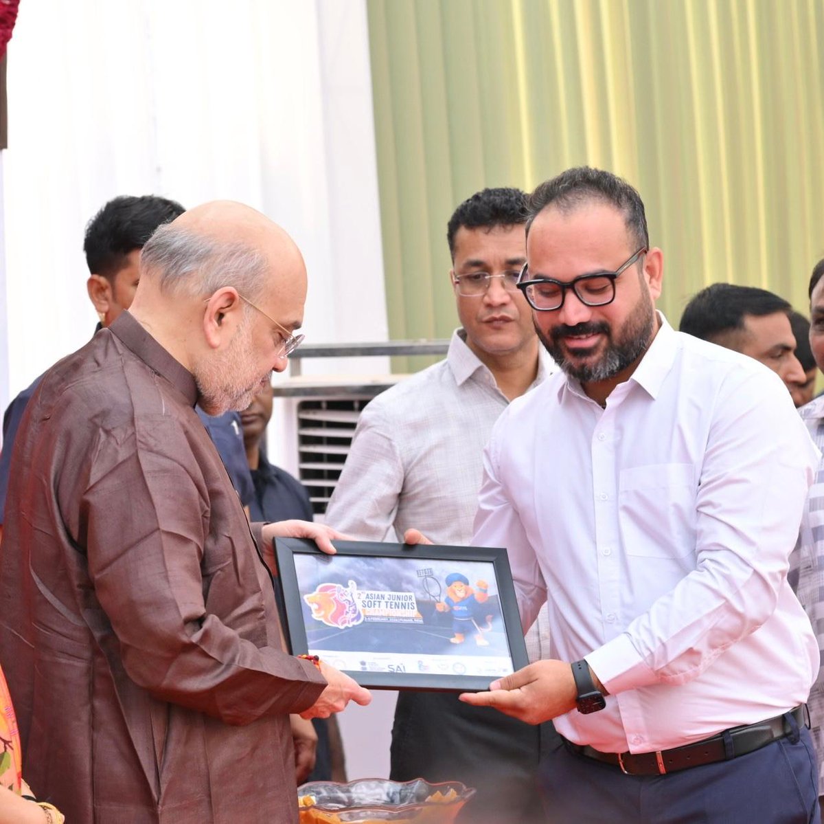 softtennis_ind's tweet photo. The logo &amp; mascot Sher Singh of the 2nd Asian Junior Soft Tennis Championship (3–8 Feb 2026) was unveiled by Hon'ble Shri @AmitShah Ji. He appreciated the organizers’ efforts and welcomed players and officials from 28 Asian nations to Punjab. https://t.co/3ozPdQFtLV