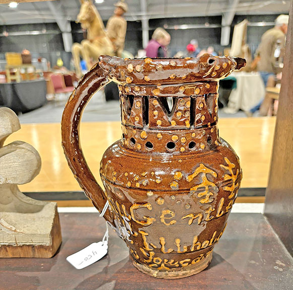 AntiqueDigest's tweet image. At the Boxboro Antiques Show: Sandy Jacobs of Swampscott, Massachusetts, said the ceramic puzzle jug is English, c 1860. The slip lettering reads “Come Try Your Luck” and the price was $450 maineantiquedigest.com/stories/steiff… #antiques #antique #ceramics #English #puzzle #jug