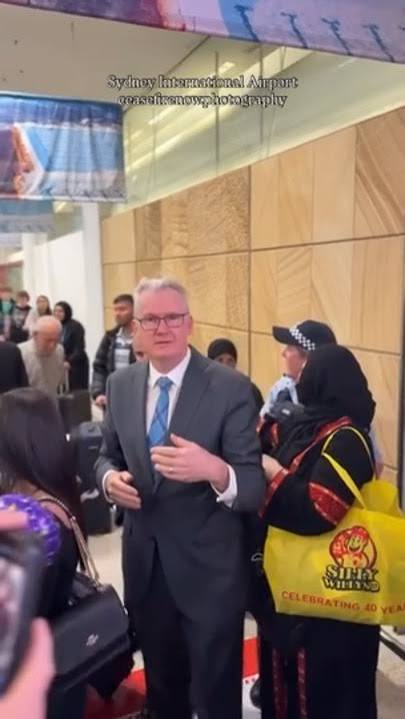 The Australian government welcomes them at the airport.