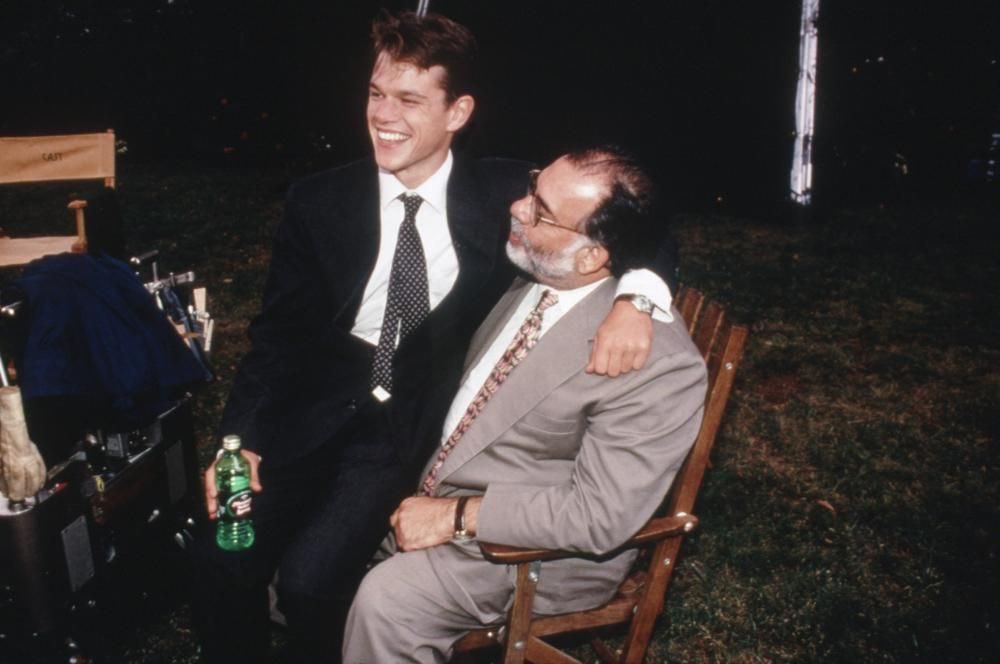 oceanssixteen's tweet image. matt damon sitting on francis coppola's lap on the set of the rainmaker, 1997