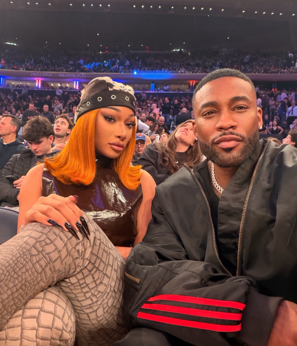 Megan Thee Stallion with Kellon Deryck at the Mavericks-Knicks game in New York today.