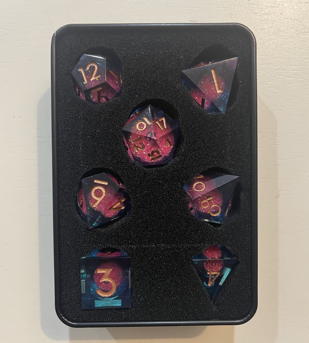Every Tuesday I play DnD with a group of online friends. My friend &amp; mod that is in the group sent me my first ever dice set. I’m obsessed! 🥹🖤