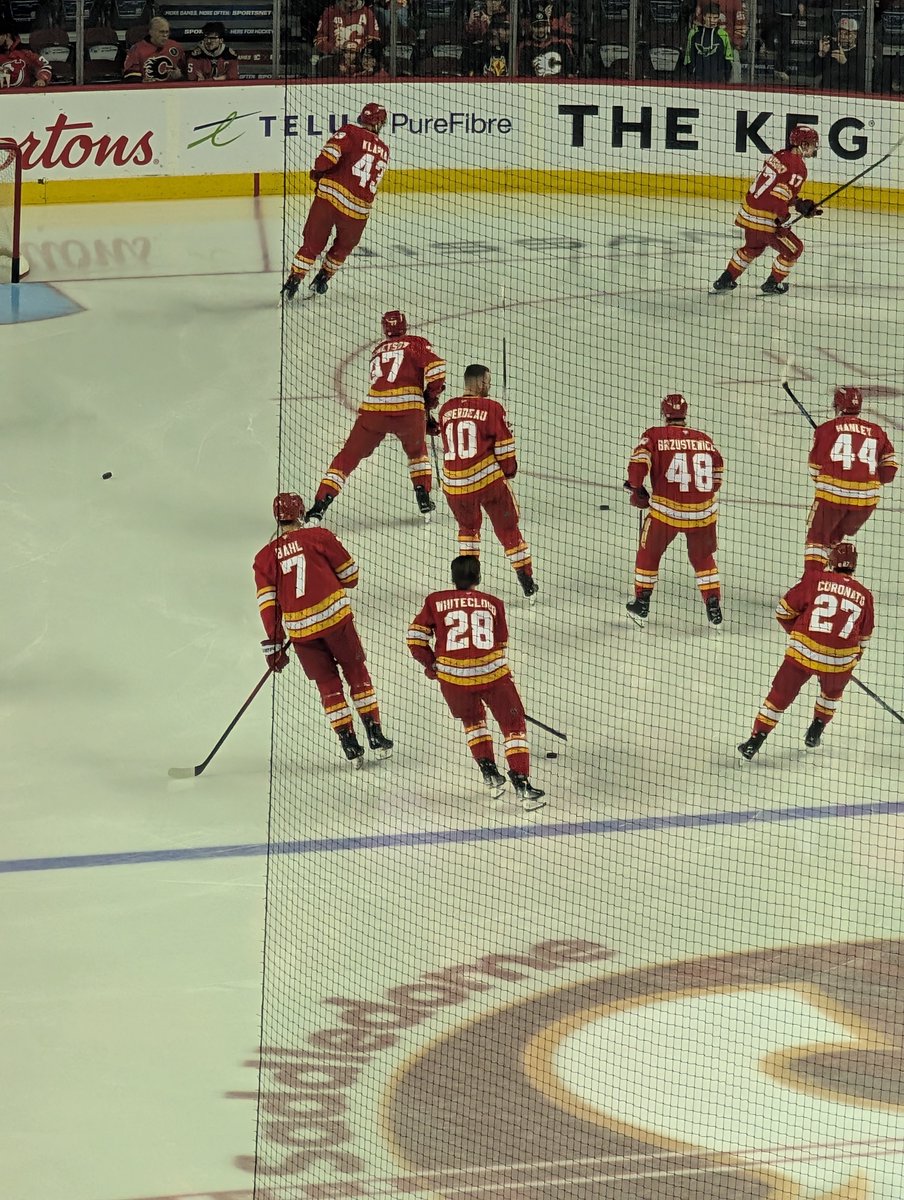 Whitecloud warms up for his first game as a #Flames player without a helmet.