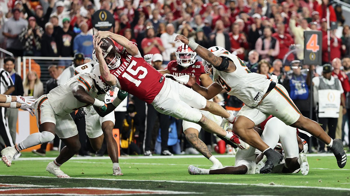 MattNorlander's tweet image. Fernando Mendoza's fourth-down touchdown dart is an instantly iconic play and image.

Here are two excellent angles.

LEFT: Kim Klement Neitzel, Imagn Images

RIGHT: Carmen Mandato, Getty Images