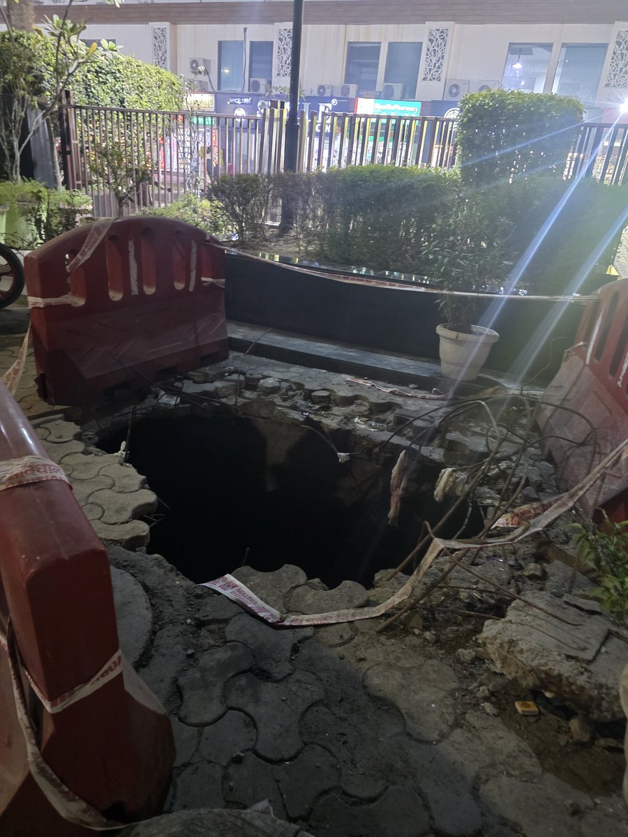 cakinshuk's tweet photo. @CeoNoida @dmgbnagar @noida_authority @CMOfficeUP (1) Noida Authority officials broken the footpath opp. to our society market Gulshan Vivante Sec 137 just for the sake of checking mixing of sewage water in to the drain at 5 places almost a month back. https://t.co/26xB1PahQd