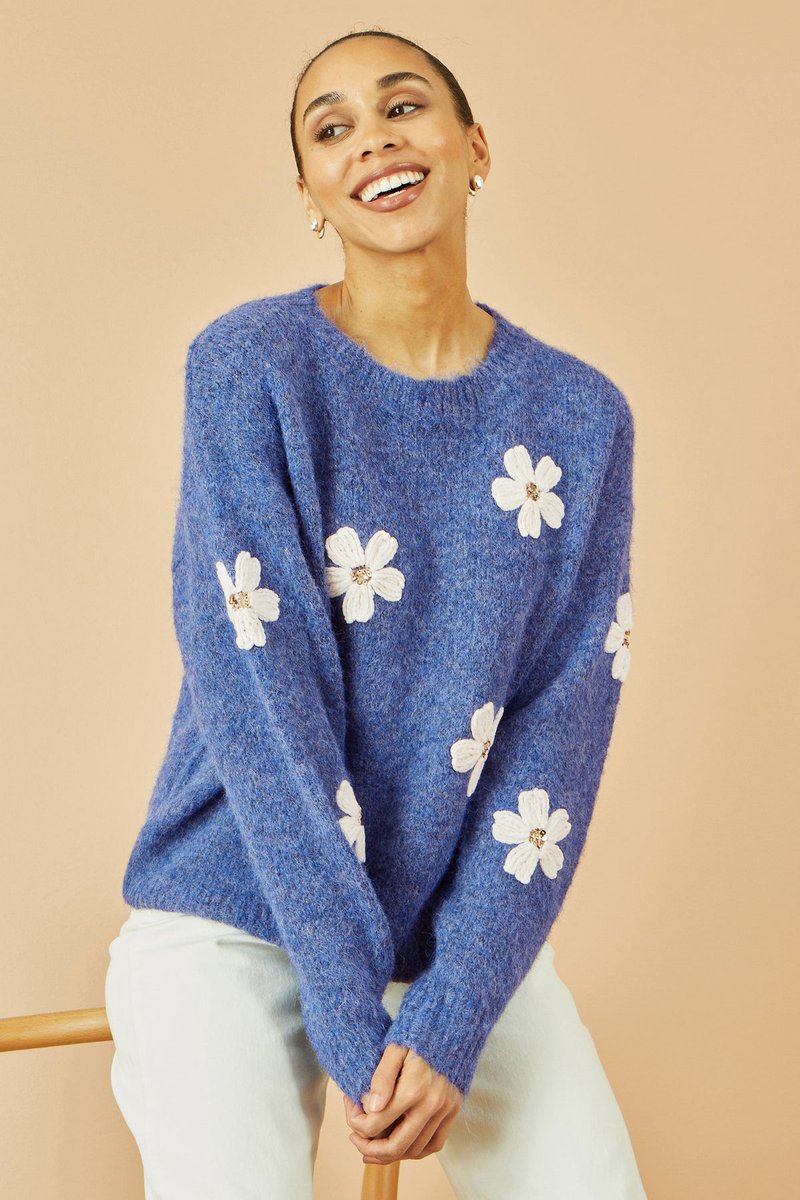 Stay stylish and cosy in the Yumi Blue Relaxed Jumper with Crochet Flowers! Perfect for adding a feminine touch to your winter wardrobe. Check it out at experiencethedifference.co.uk/products/yumi-… #winterfashion #knitwear