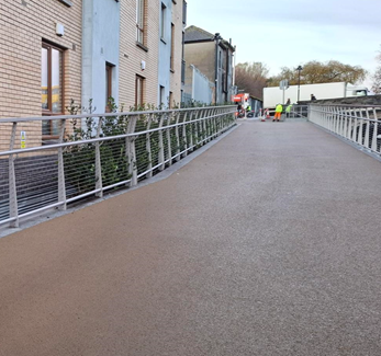 DubCityCouncil's tweet photo. Exciting updates from the Royal Canal Phase 3 Scheme! Jetty works at Portland Lock Apartments which began in November, are nearly complete. In December, the access gate was relocated and laurel bushes were replaced with native holly. Installation of additional railings near Binns Bridge is ongoing. #ActiveTravelNetwork
