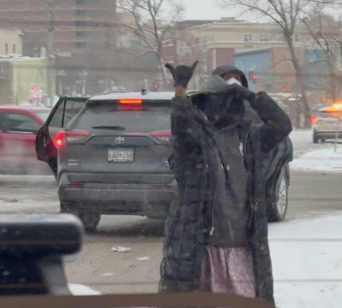 Last night while editing I recognized this woman as being the same person who stole <a href="/nicksortor/">Nick Sortor</a>’s camera.

She had been yelling at us from a different car. The pink glasses, the hoodie, pink skirt, and jacket sleeve match the snatcher. 

The car she came in is different than the