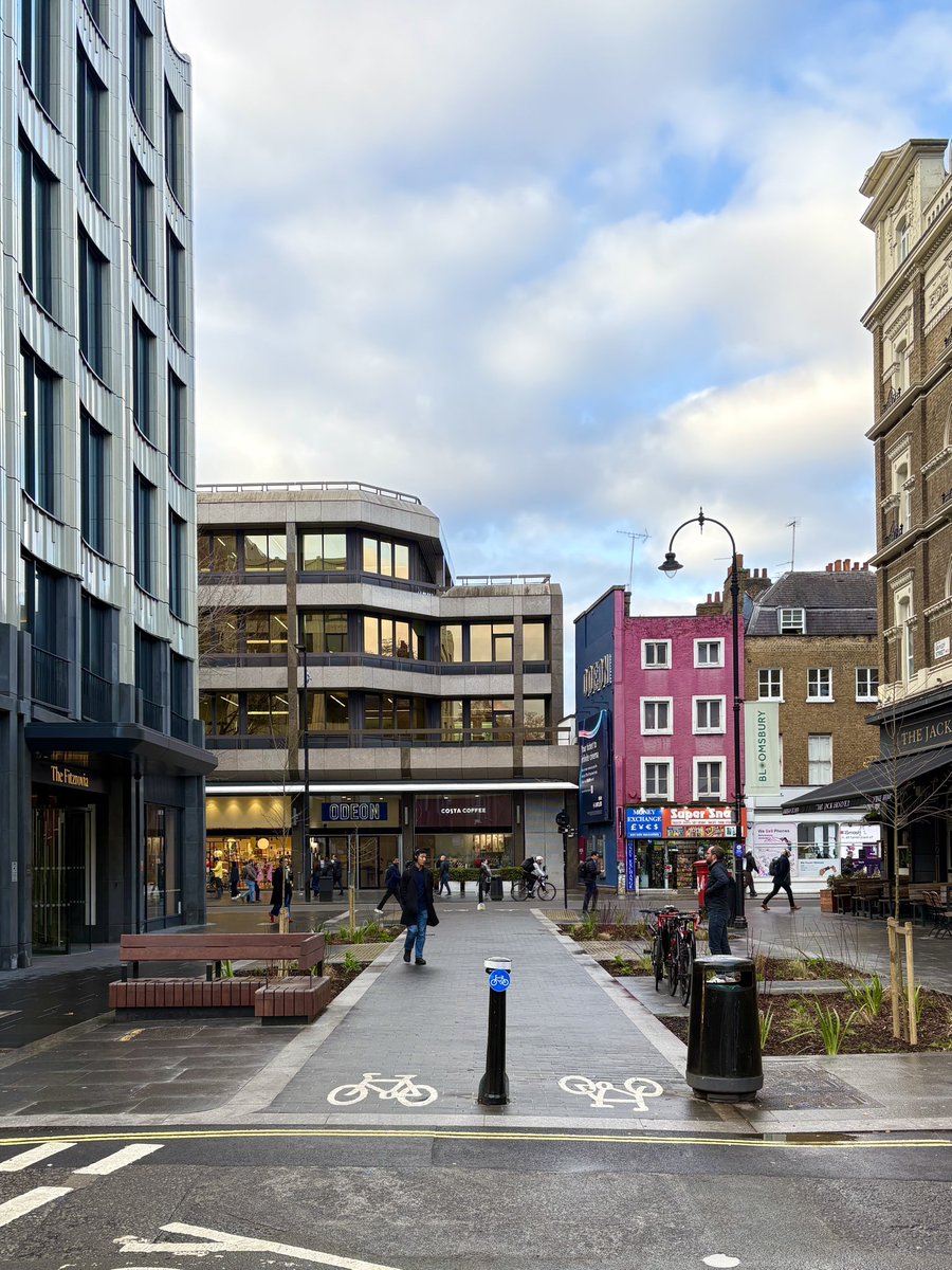 BobFromAccounts's tweet photo. When you get rid of cars, the noise, the danger and pollution they bring, then add gardens, seating, cycle lanes and public space, no one ever wants it to return to its previous incarnation. Keep going London. Bayley St, Bloomsbury https://t.co/e97P0u8ehs