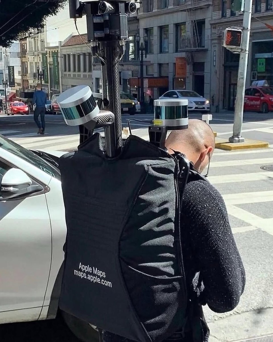 rogue's tweet image. Apple Maps camera backpacks used to capture street level images for its Look Around feature