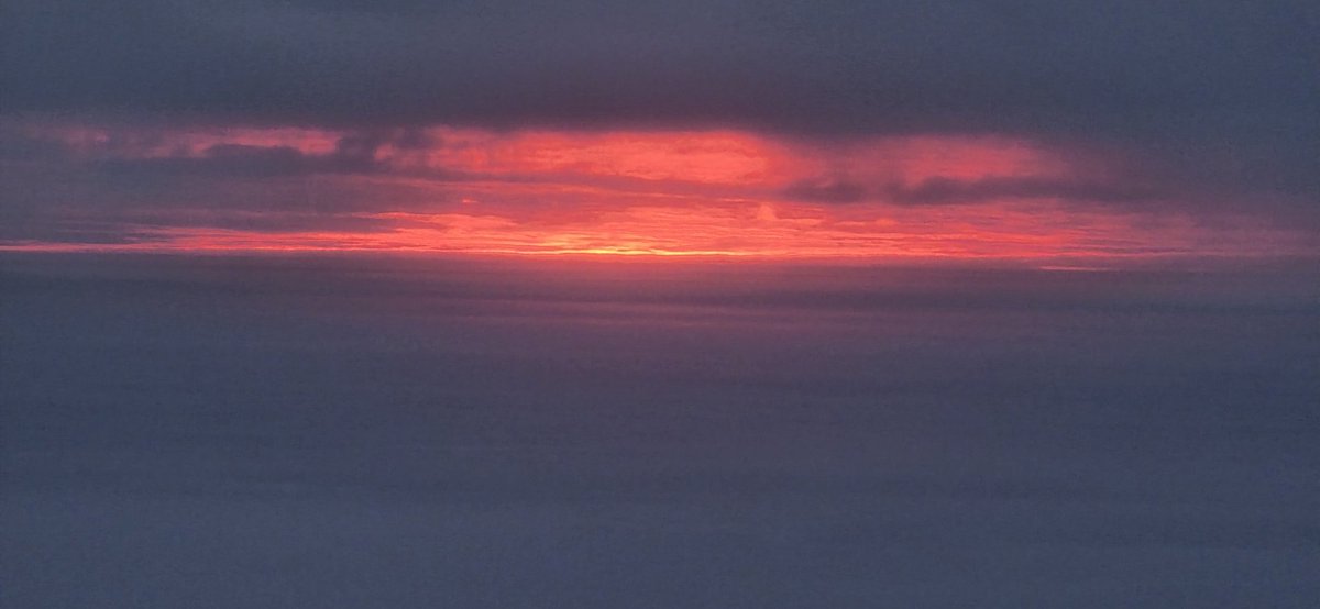 An arctic sunset from atop a mountain