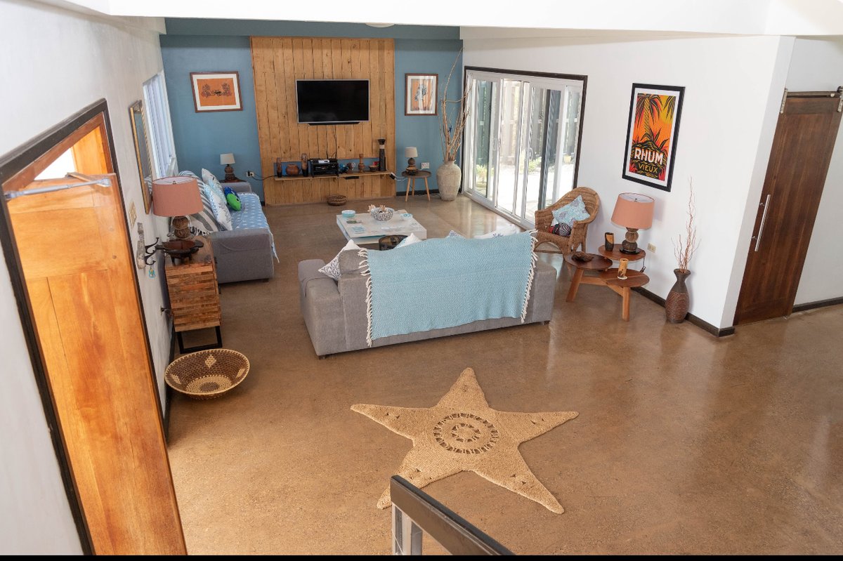 TurtlesNestJa's tweet photo. Our open plan sitting room. With the doors open the sea breeze floats through, meaning there’s no need for a/c and affording a natural vibe. https://t.co/t1sm4dsqS8