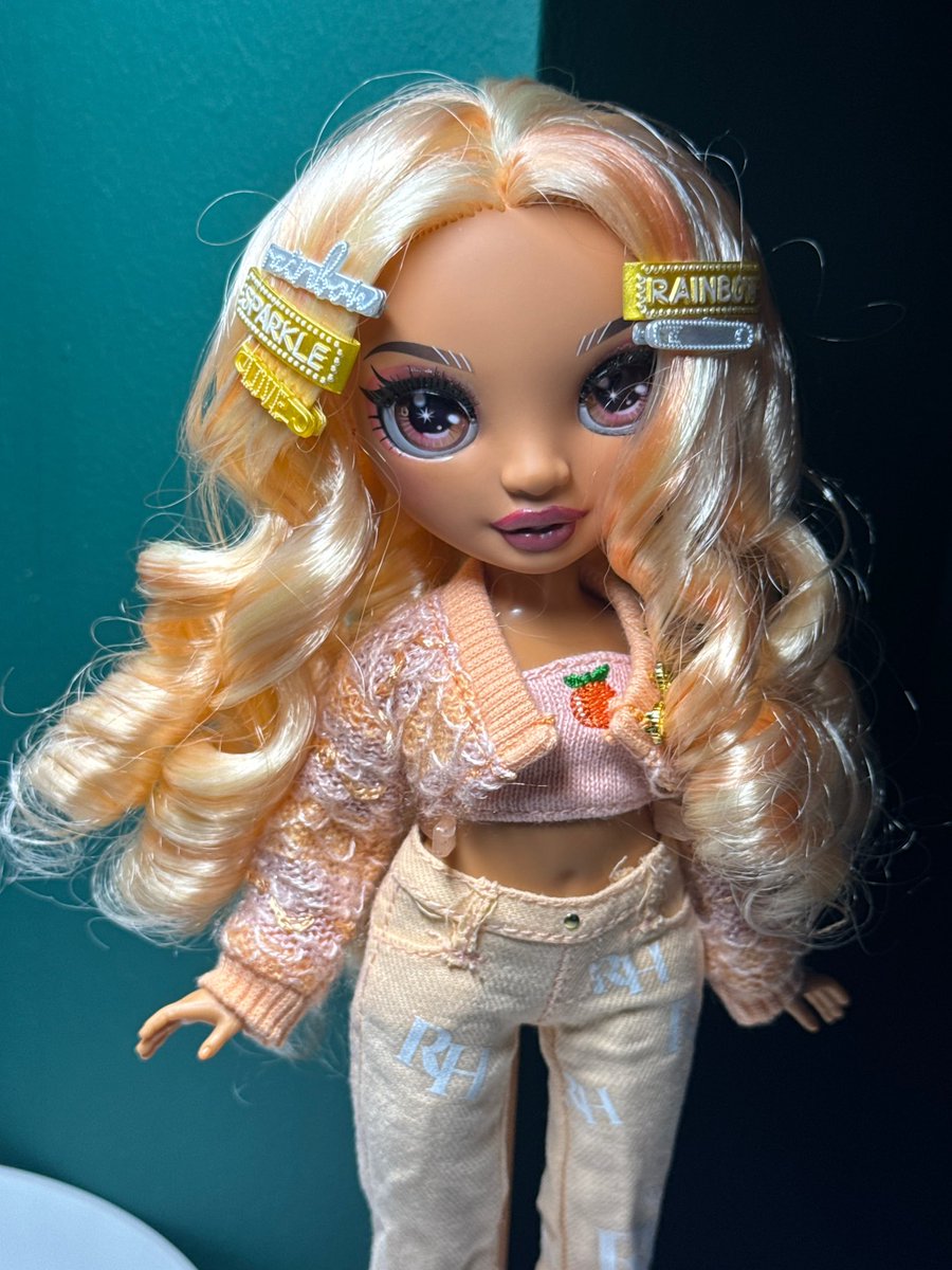 I redressed Georgia after 5 years… by the way, these curls were made using a pencil and hot water, and lol, they’re still holding up…😁