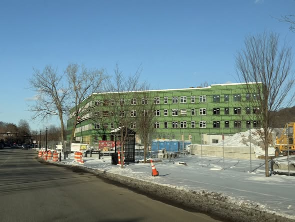 New transit-oriented housing under construction in Naugatuck, CT. 180 units of mixed-income apartments, along with 7,000 sq ft of commercial space. Right next to the new train station!