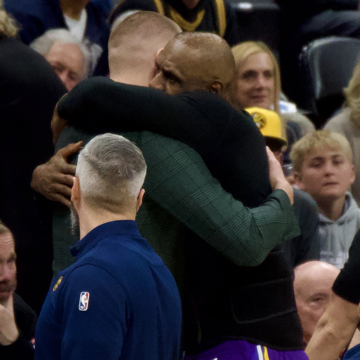 LeBron came over to hug Jokic during the timeout