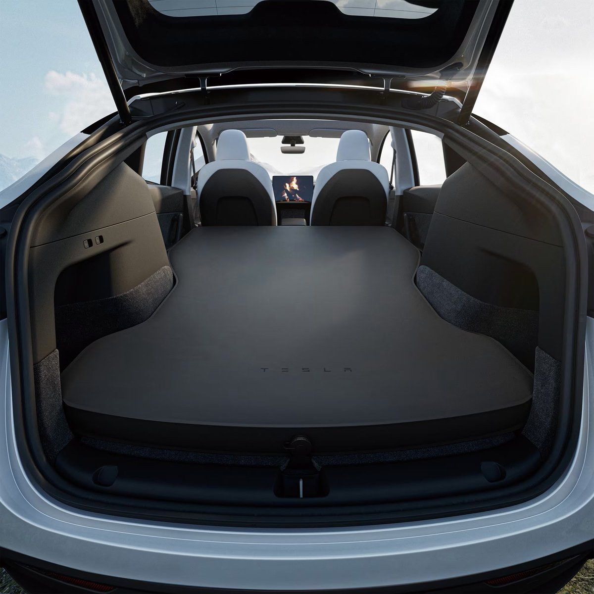 Tesla's tweet image. Model Y Air Mattress → shop.tesla.com/product/model-…