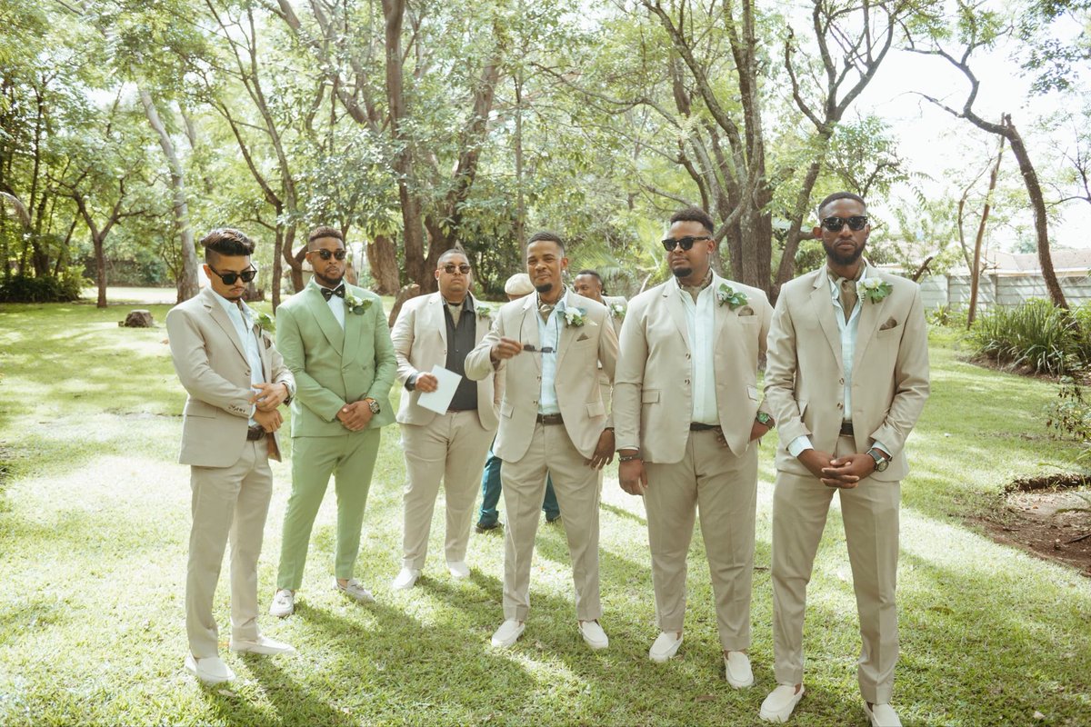 dapperkingszim's tweet photo. Sage serenity meets sandy elegance. Denzel in a double-breasted sage green tux, while the groomsmen ride a relaxed Italian breeze in beige 2-piece suits with cravat scarves, paired with nude loafers , simply Dapper https://t.co/ytq5tOSfE9