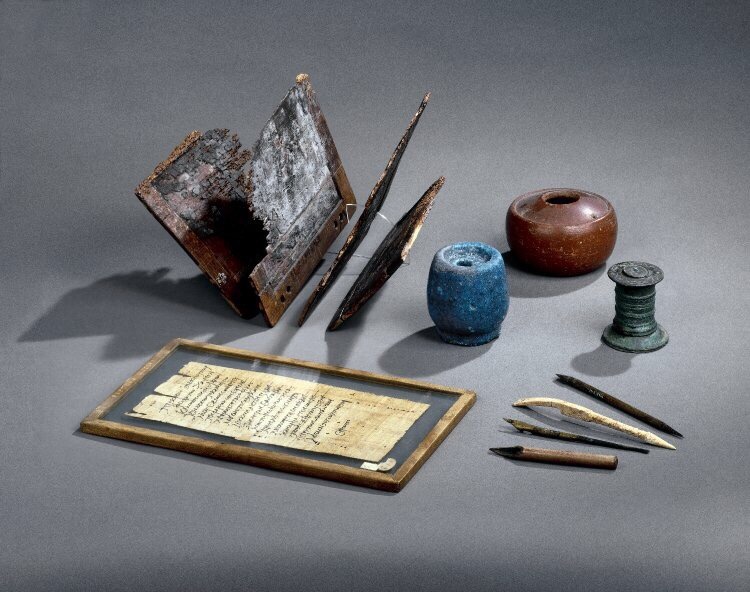 Writing implements: stylus, wooden writing tablet, ink wells, Roman, 1st century