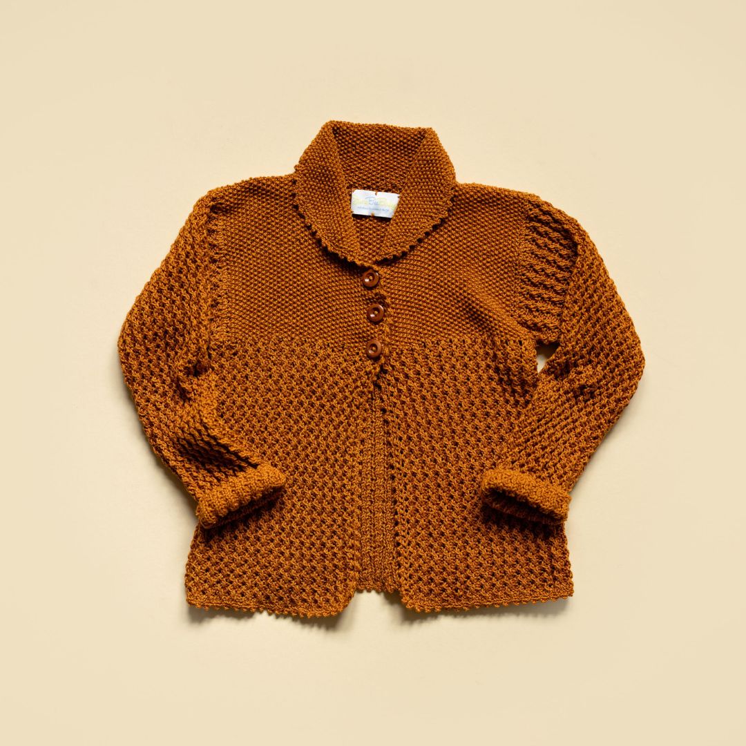 Meet the Adele Cardi in cinnamon. Handmade. Lace knit. Available in stock now at junebeebaby.com