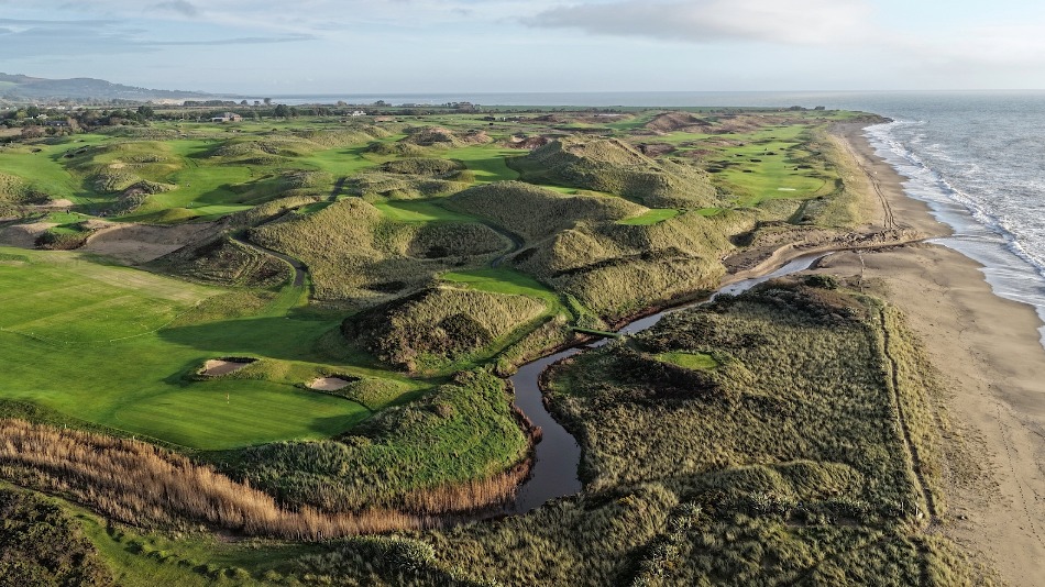 gcamagazine's tweet photo. Architect @KylePhillipsGCD is prioritising playability for his redesign of The European Club, which will become known as Brittas Bay Club. Work on the Irish links is in progress with a vision “to realise the full potential of this site”. Ireland based consultancy firm Turfgrass has been appointed as owner’s representative, project manager and agronomic lead. @GolfLinkEvolve will be responsible for construction.

Read the full story: https://t.co/CfEWsCWkA0

📸@droneguysirl, @kevinmarkham and Mel Maclaine