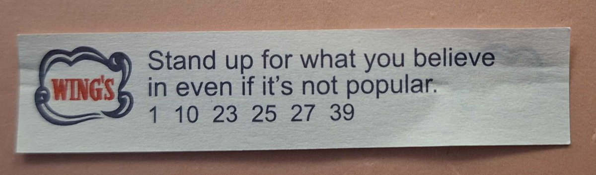 We were out for a nice supper with a group of friends the other night.  When the fortune cookies arrived, this was mine.