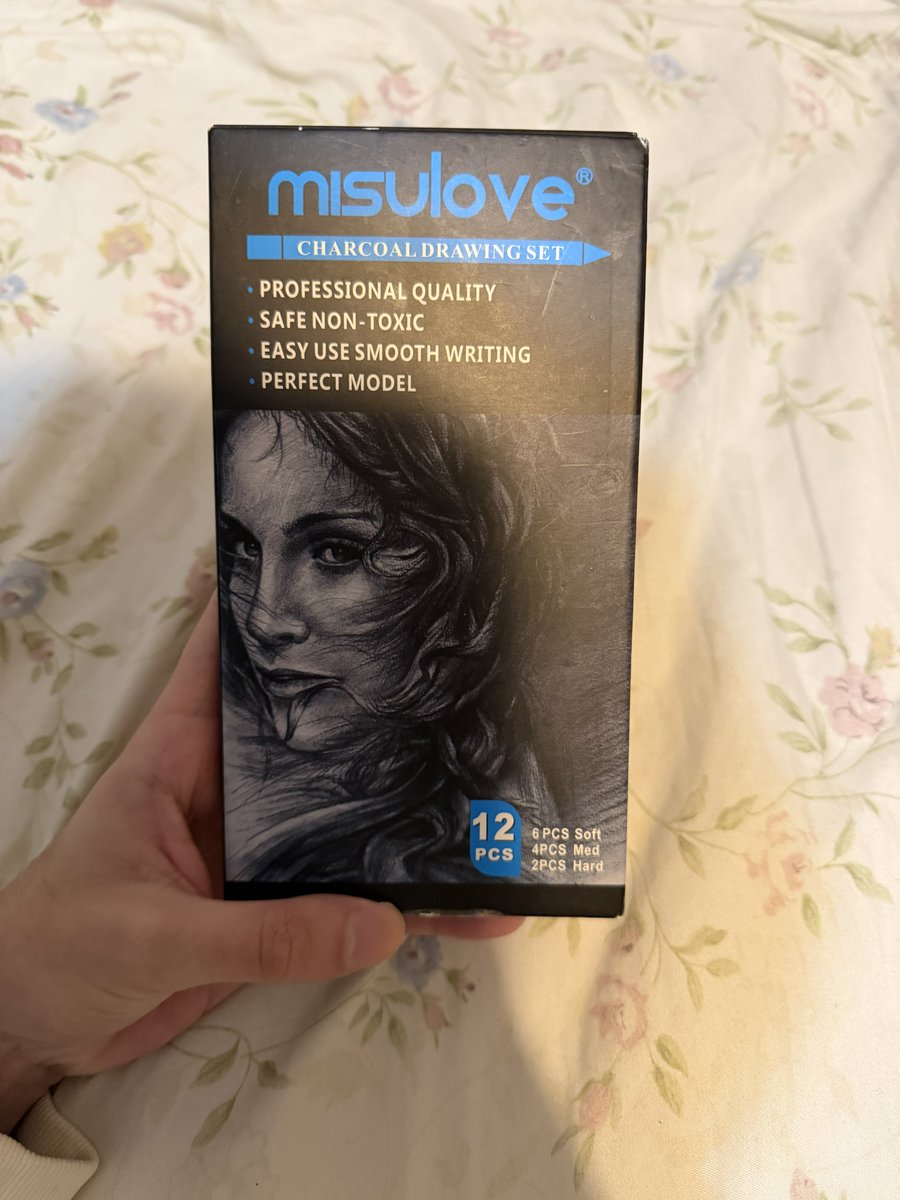 my charcoal drawing pencils randomly having a drawing of ray of light madonna on the packaging