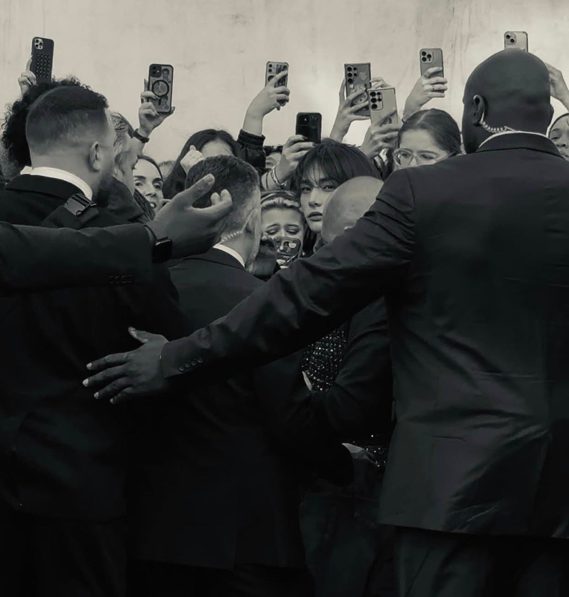 Hyunjin photographed at Dior like a main character in a cinematic scene.