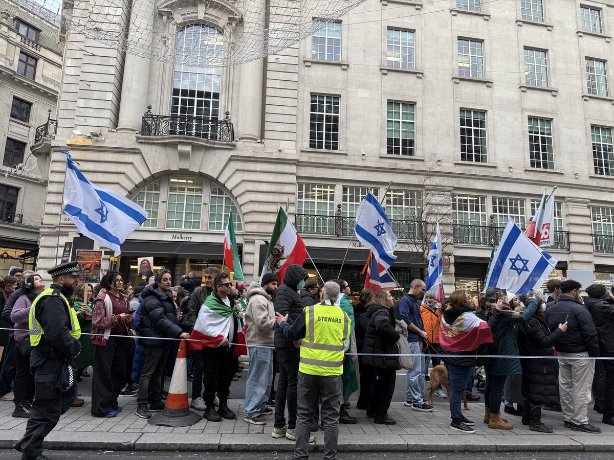 MaxBlumenthal's tweet image. Flags of the genocidal Israeli regime are almost as prominent at daily London rallies for “freedom” in Iran as the monarchist flag

Is it any wonder the world fails to find inspiration in this pro-war movement?