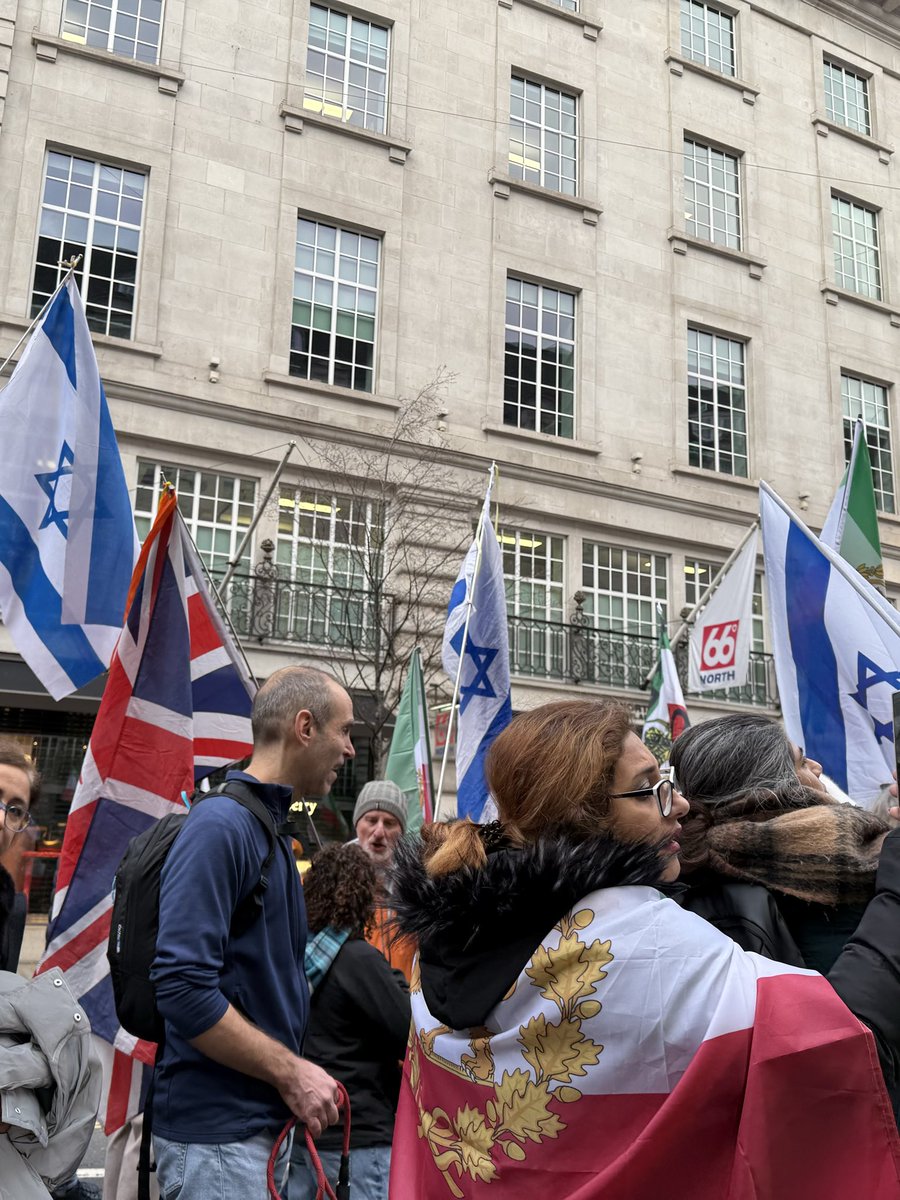 MaxBlumenthal's tweet image. Flags of the genocidal Israeli regime are almost as prominent at daily London rallies for “freedom” in Iran as the monarchist flag

Is it any wonder the world fails to find inspiration in this pro-war movement?