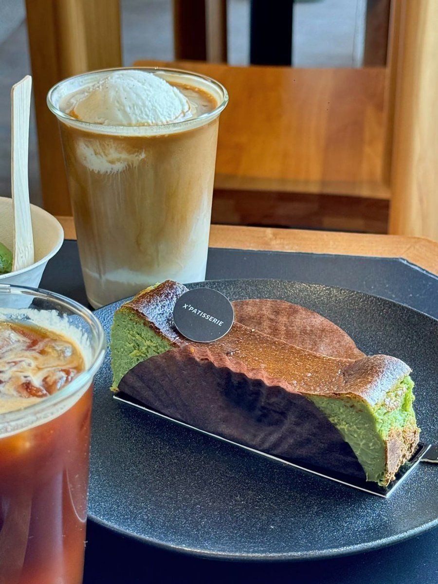 Slow afternoons are for cold brews and matcha treats. 🧊🍃 Taking a break from the hustle to enjoy the finer things: a velvety slice of cheesecake and the perfect scoop of gelato. The view, the brew, and the company—perfection. ☁️🪨
